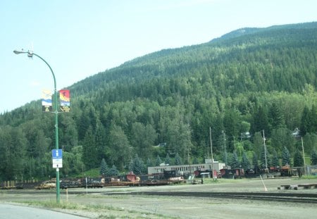 The Rockies mountains in BC - Canada 76 - train, sky, mountains, photography, station, trees, green