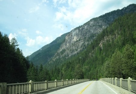 The Rockies mountains in BC - Canada 87 - Mountains, clouds, roads, trees, white, green, photography, sky