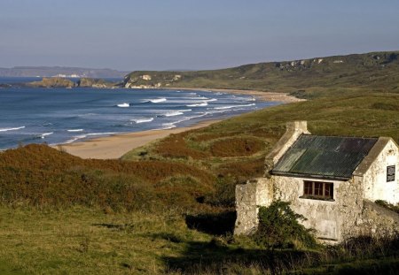 beautiful bay in ireland - stone, beach, waves, cottage, bay