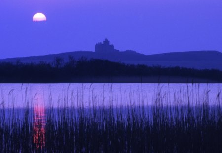 silhouette of a castle under a moon in ireland - moon, silhouette, lake, reflection, castle