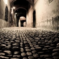 cobblestoned alley at night