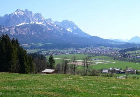 town of st. johann tirol in austria - trees, town, grass, mountains, valley