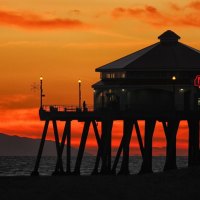 restaurant on a pier at sunset