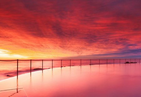 superb sunset on an australian beach - red, clouds, rail, beach, sunset