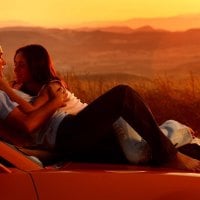 Lovers on the car hood