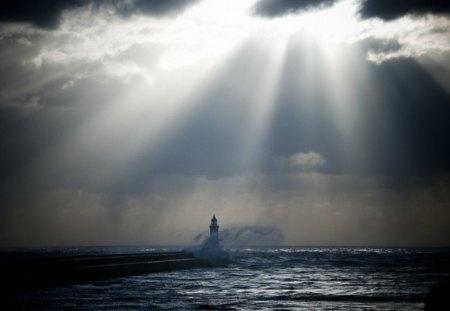 Lighthouse in sunrays - lighthouse, night, water, sunrays, waves