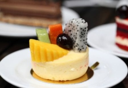 Cream cake - cream, desserts, delicious, toppings, food, sweets, plate, cake, fruits