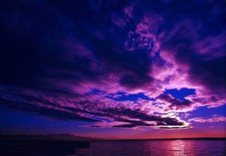 Purple Skies - water, reflection, clouds, sea, skies, nature, colorful