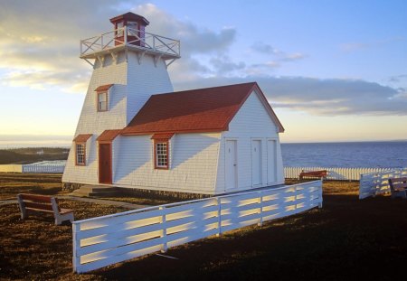 lighthouse with a white picket fence - clouds, lighthouse, cliff, sea, fence