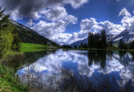 A Dark Day - clouds, trees, water, blue, grass, forest, reflection, mountain, nature, green, land, lake, sky