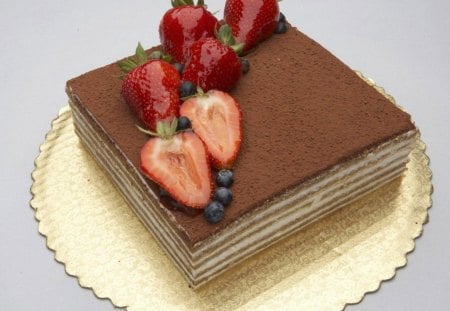 Strawberry Topped Chocolate Layer Cake - strawberry, delicious, blueberries, fruit, cake, abstract, sweet, layers, chocolate