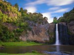 cascade under a blue sky