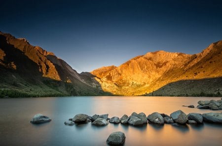 sunrise on a rocky lake - lake, mountains, rocks, sunrise