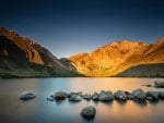 sunrise on a rocky lake