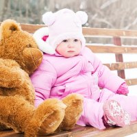 Girl and teddy bear