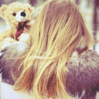 Woman and teddy bear