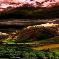 mean skies over a valley hdr