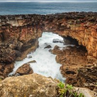 sea waves through a rocky shore