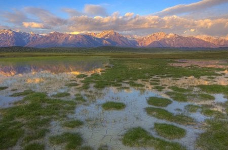 glorious wetlands to mountain range - wetlands, mountains, grass, clouds