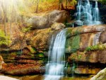 beautiful cascading waterfall down a mountain