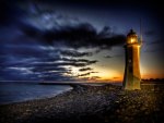 lighthouse on a rocky point hdr