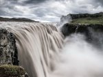 powerful waterfall over rock ledge