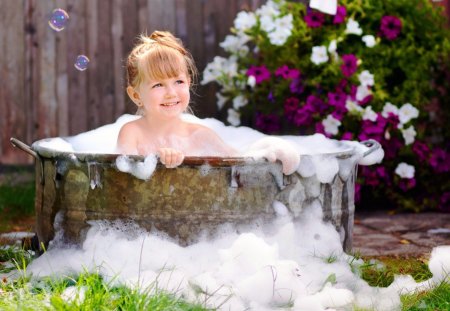 A Girl Enjoying A Bubble Bath