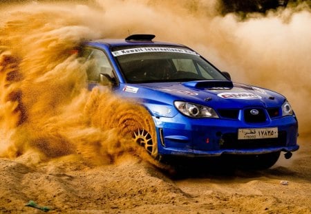 Subaru impreza - impreza, subaru, wrc, dust, off-road, racing, blue car, rally, sand