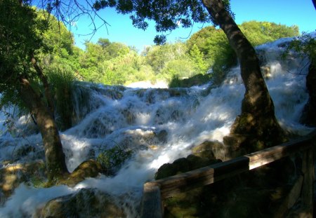 more a flood rather than a waterfall - hill, flood, trees, rocks