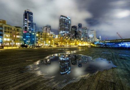 puddle on a city waterfront pier hdr - clouds, hdr, city, reflection, pier, puddle