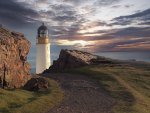 stone road to a beautiful lighthouse