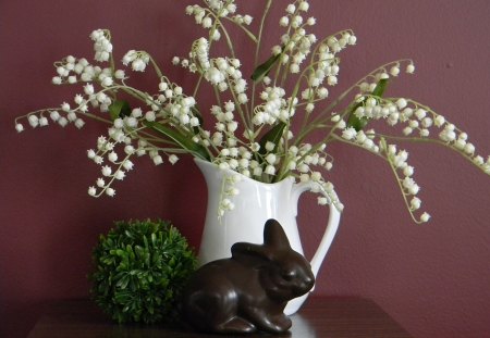 Easter Still Life - pitcher, vase, chocolate, table, spring, still life, bunny, easter, flowers, Lily of the Valley, holiday