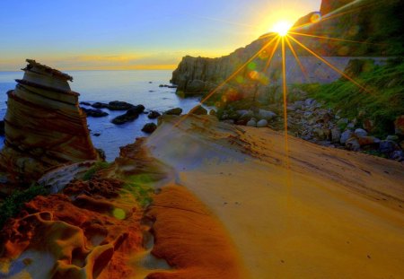 GOLDEN RODS - golden sand, rock, horizon, rays