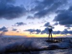 lookout tower at a rough seashore