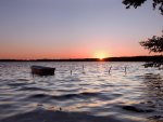 boat on a lake at sunst