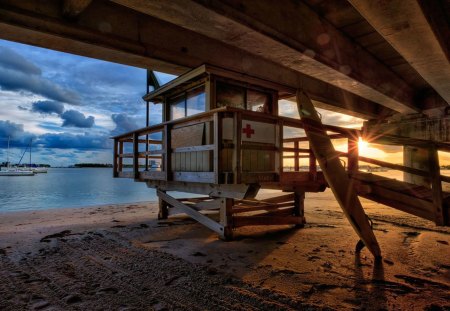 life guard station under the boardwalk - hut, boardwalk, beach, boats, sea