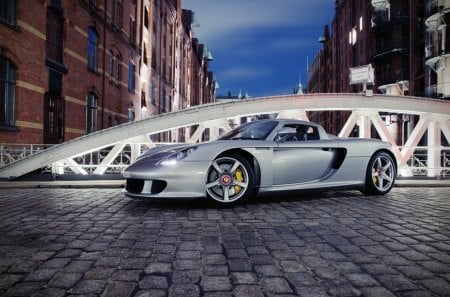 porsche carrera gt on a bridge - city, cobblestone, bridge, car