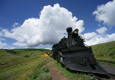 mighty steam train in a station - clouds, tracks, plow, tarin, station