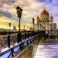 a bridge to a beautiful church in winter hdr