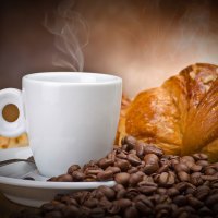 *** Coffee with a delicious croissant for breakfast ***