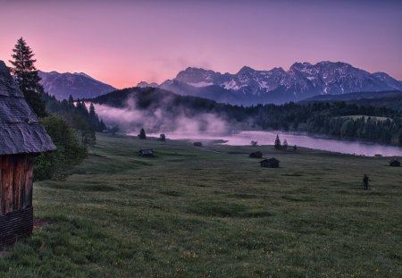 cabins on the meadow with fog off the lake - fog, cabins, lake, meadow, morning, mountains