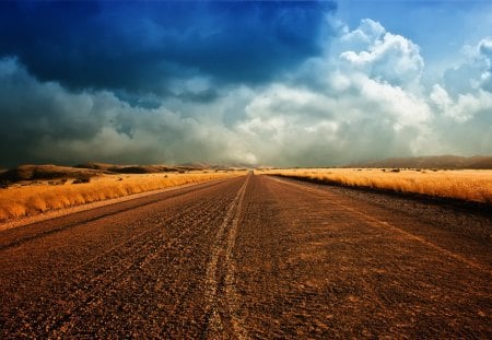 dirt road under stormy clouds - storm, road, clouds, fields, dirt