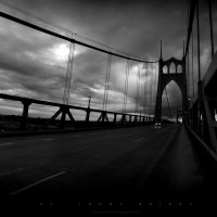 stormy skies over bridge