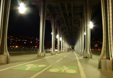 bike lanes under a bridge - lanes, columns, lights, bridge