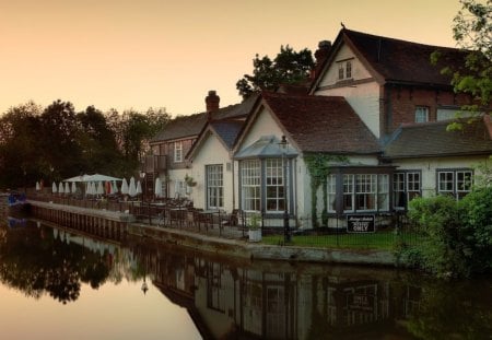 riverside restaurant at sundown - restaurant, reflection, river, boat, sunset