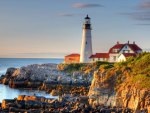 perfect lighthouse on a rocky shore