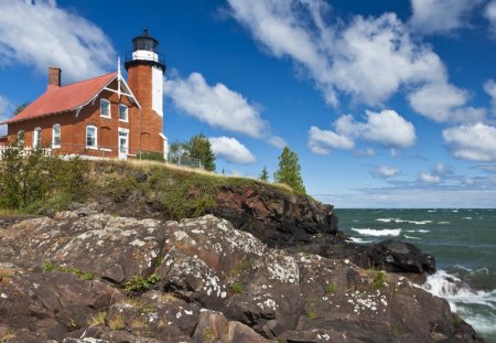 red brick lighthouse on a cliff overlooking the sea - clouds, lighthouse, brick, cliff, waves, sea