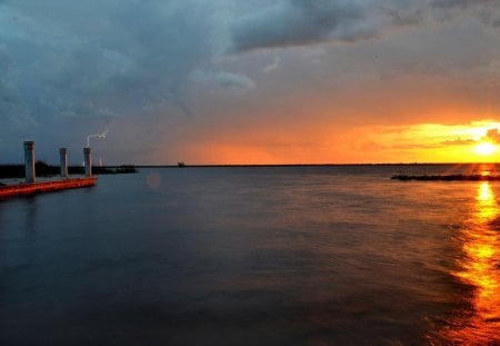 lightning at sunset - lightning, clouds, pier, sunset, sea