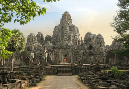 beautiful eastern temple - stones, trees, priest, temple