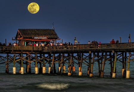 moon over tiki bar on a pier - moon, pier, people, bar, sea